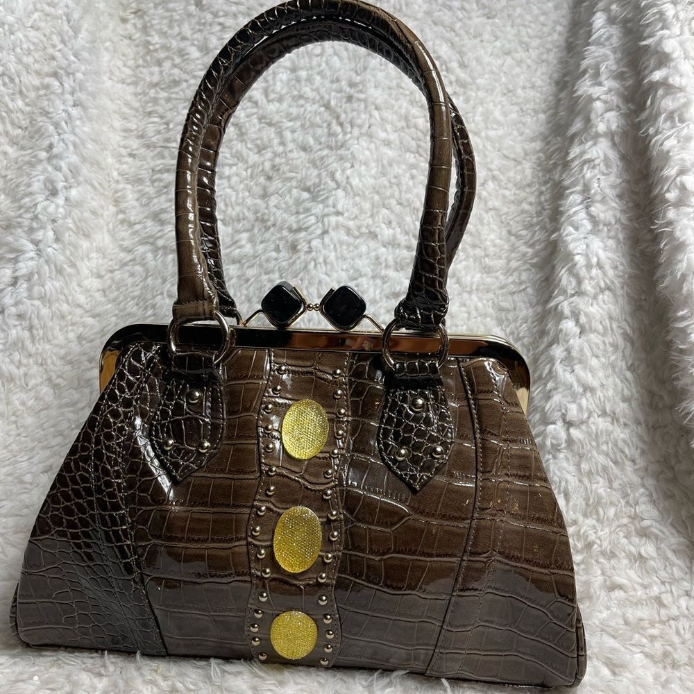 Elegant Brown Croc embossed faux leather Brown patent Satchel gold tone frame.